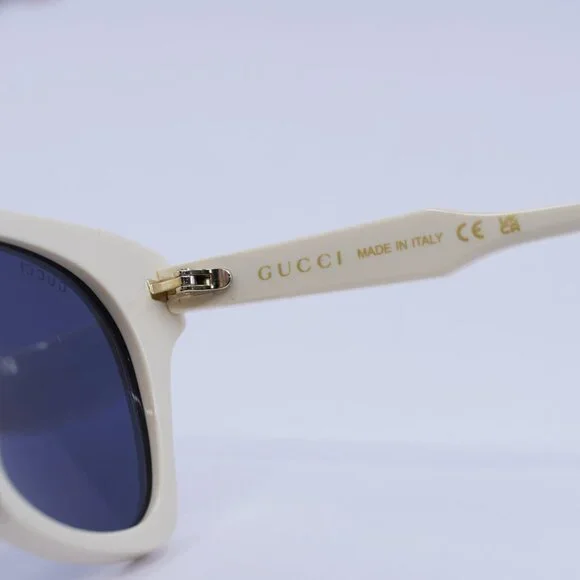 Gucci GG1299S 004 Sunglasses Ivory with Stones Cat Eye Frame, Blue Lenses